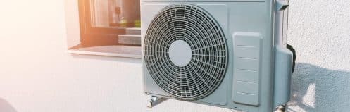 Henderson NV outdoor AC condenser unit running during a summer heat wave