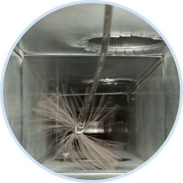 Duct system cleaning with rotary brush during professional duct cleaning services