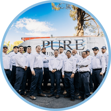 Pure Plumbing team standing in front of service van, trusted plumbing and HVAC company in Las Vegas