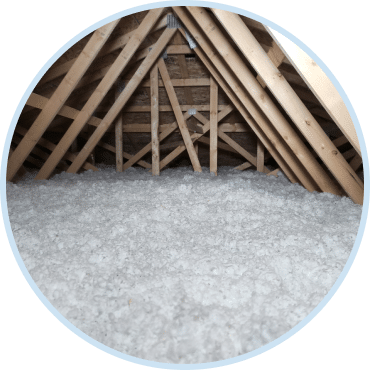 Attic upgraded with blown in insulation services to improve home energy efficiency