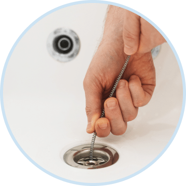 Professional drainage cleaning services clearing bathtub drain in Las Vegas